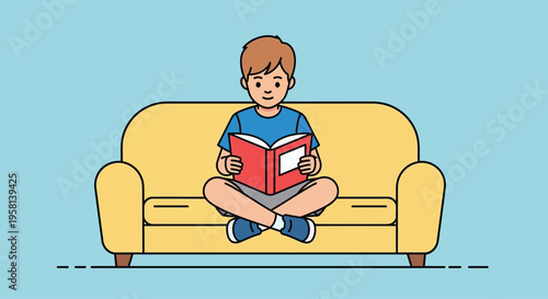 Young Boy Reading Book on Sofa.
