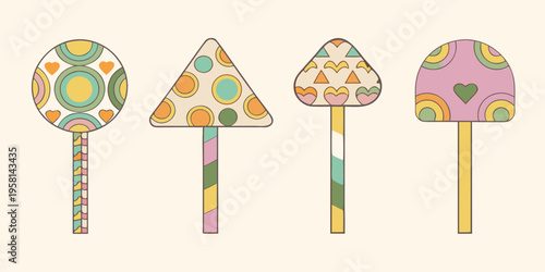 Colorful patterned mushroom shapes stand in a row on a pale background