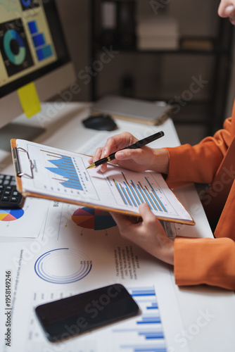 Professional analyzing financial business report data