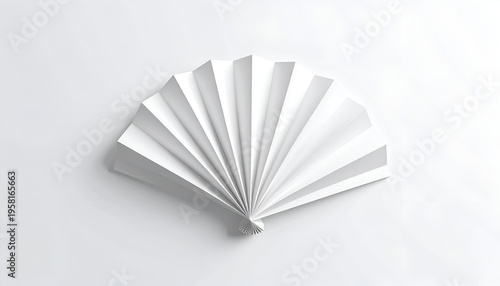 White folded paper fan on seamless clean background in studio shot for design use
