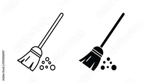 Silhouette of two brooms sweeping up debris in a simple black and white illustration