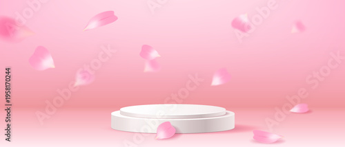 Pink petals gently float around a white podium. The soft pink background creates a serene and elegant atmosphere. Ideal for beauty and cosmetic displays.