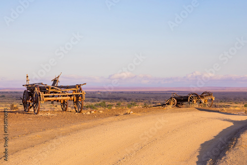 Vintage ox wagon abandoned in arid desert