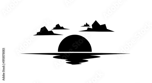 Sunset over water with mountains.