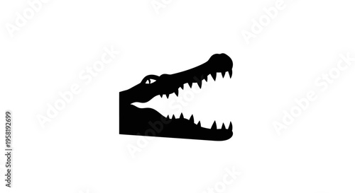 Black silhouette of crocodile head.