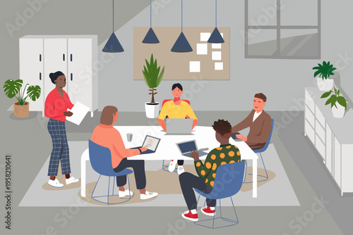 Diverse group collaborating in a modern office meeting space