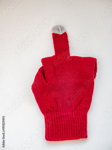 Top view of white cotton knitted gloves isolated on white