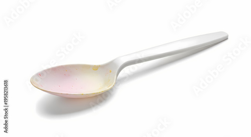 Used Disposable Plastic Spoon Slightly Stained Isolated on White Background