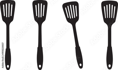 Four black silicone spatulas with handles 