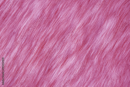 Bild auf Leinwand Detailed close up view of vibrant pink fluffy faux fur fabric background texture