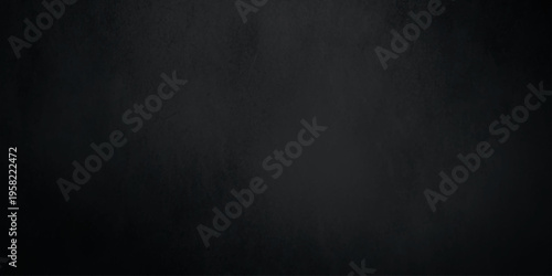 A dark blue grunge background featuring a vintage scratched metal texture on a weathered concrete wall pattern for a blank dirty black chalkboard backdrop