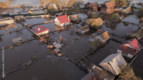 A spring large-scale flood disaster with fully submerged houses, flooded roads,and overflowing waterways. The footage shows the dramatic impact of heavy rainfall and rising water levels on residential