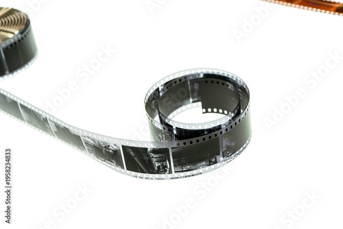 A detailed black and white film negative strip stretched out with visible images.
