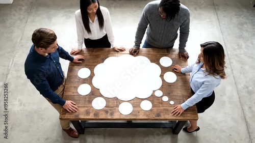 Four people gathered around table.