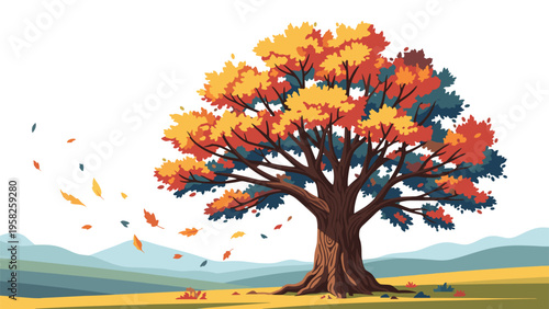 Majestic autumn tree with vibrant orange and yellow leaves shedding in the wind against a mountain range and a clear white sky.
