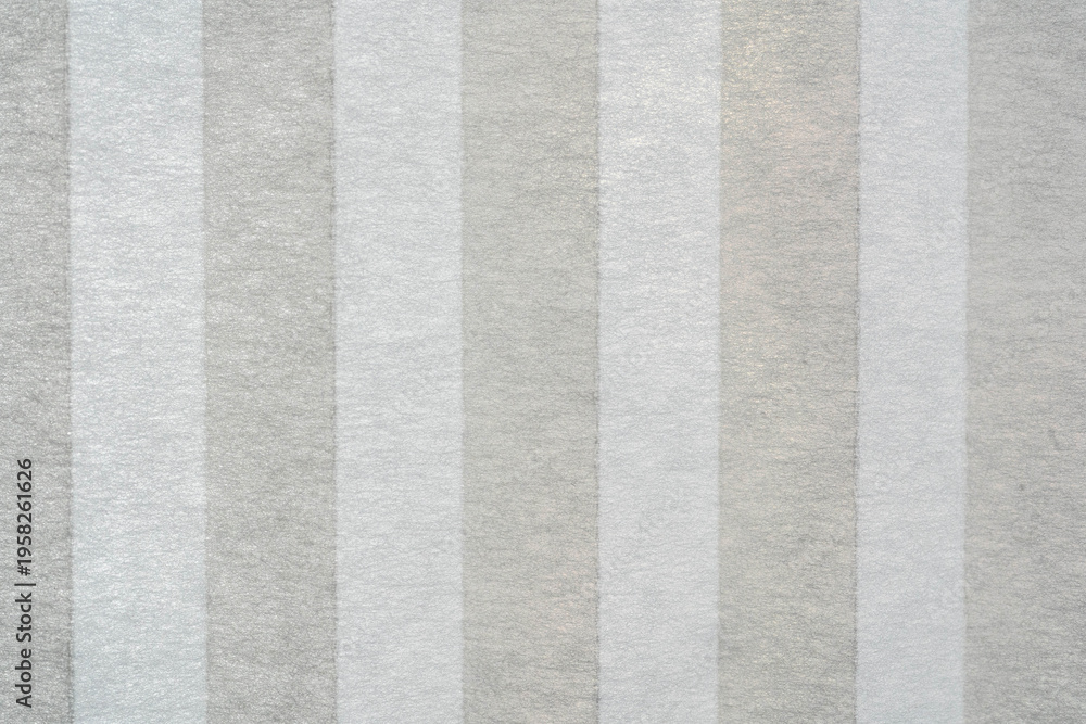 Fototapeta premium Close-up of the white textile fibers of a folded sun visor with a shallow depth of field
