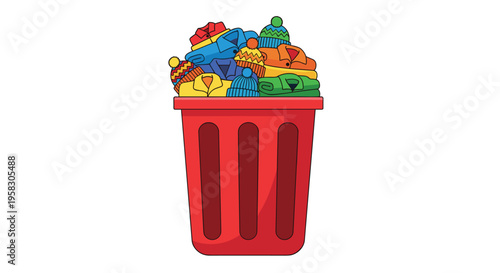 A red trash bin is overflowing with a colorful assortment of folded winter clothes and hats on a plain white background.