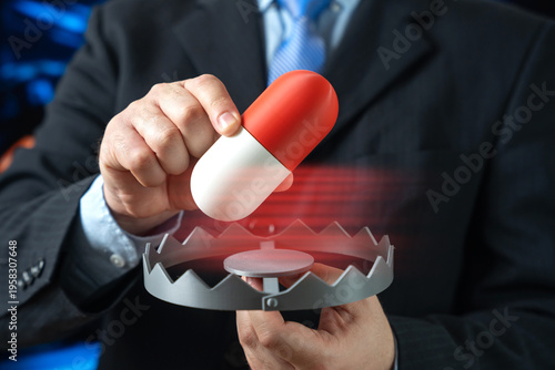 Tableau sur toile A man inserts a medication capsule into a trap