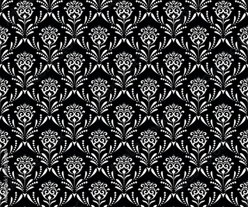 Wallpaper in the style of Baroque. White and black floral ornament. Seamless vector background. Graphic pattern for fabric, wallpaper, packaging. Ornate Damask flower illustration.