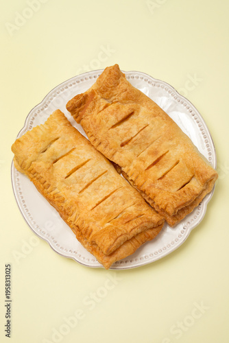 puff pastry with jam on white plate