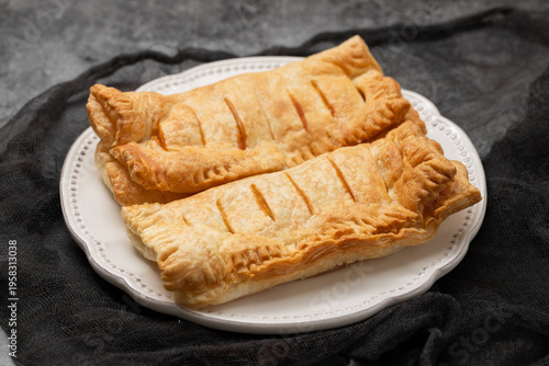 puff pastry with jam on white plate