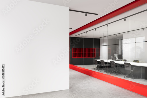 Foto Modern office interior with large empty wall for poster mockup and glass meeting room featuring red accents in contemporary architecture design
