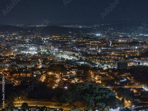 Night aerial view of Braga city lights and urban architecture, Minho region, Portugal