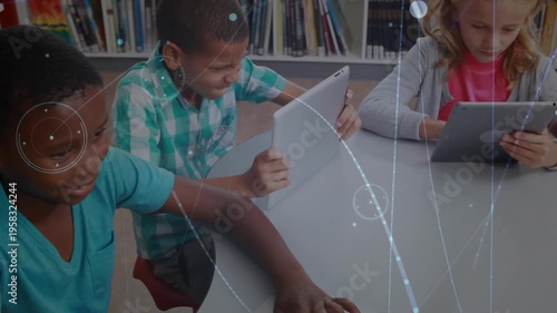 Animation of connected dots, lens flare over diverse student using technology in library at school