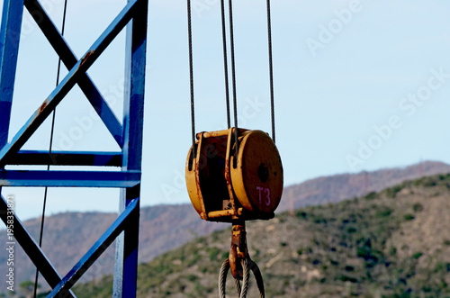 Photos The pulley of a small harbour crane with indication of supported tonnage