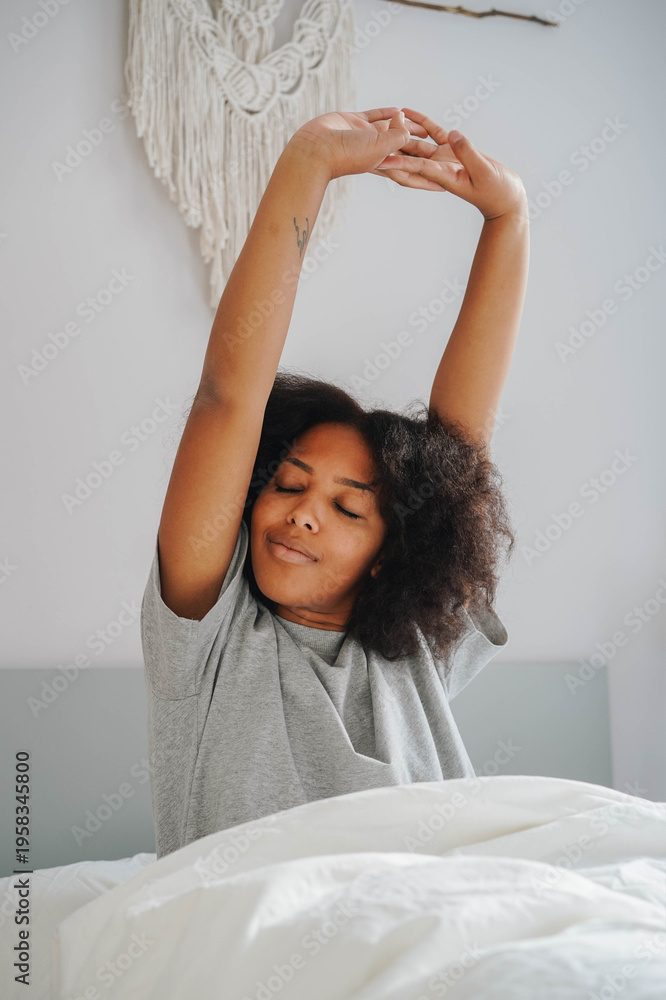 Ταπετσαρία relaxed woman stretching in bed with eyes closed after restful sleep