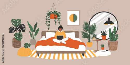 Woman working on laptop in cozy bedroom filled with houseplants and decor