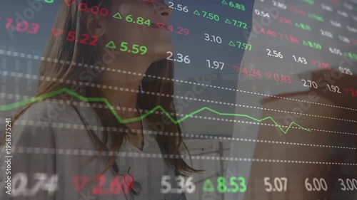 Animation of trading board over low angle view of diverse couple looking at each other on beach