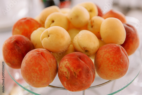 orange peaches and large yellow apricots