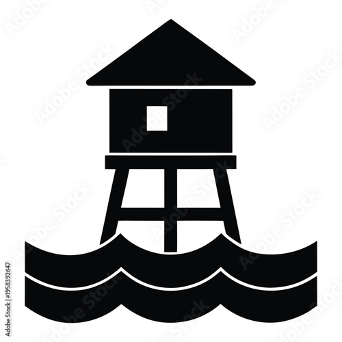 Stilt house standing in the water with waves