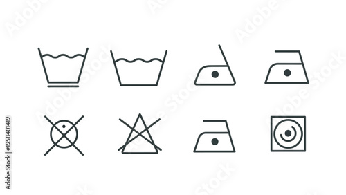 Collection of laundry care symbols including washing, bleaching, ironing, and drying instructions