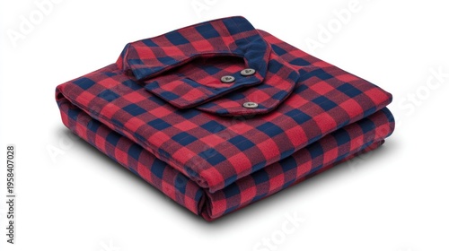Folded red and navy blue plaid shirt on white background