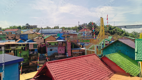 Colorful village with pedestrian bridge in Malang, East Java, Indonesia