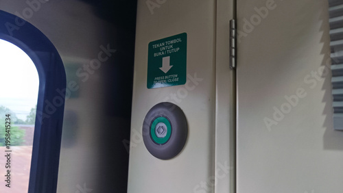 View of the button to open the train carriage door