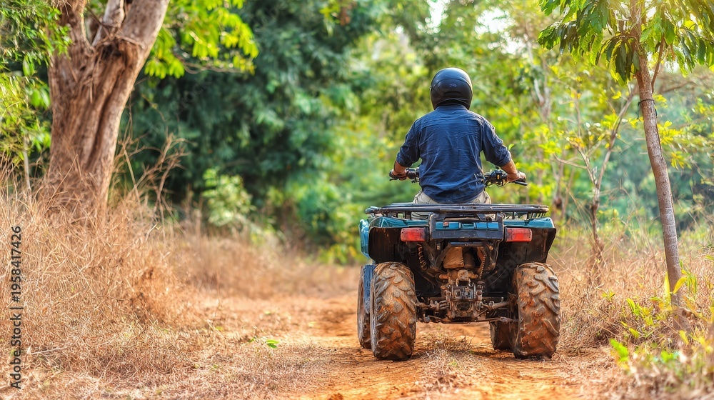 Fototapeta premium Man riding atv offroad vehicle track outdoor sport action adventure dirt speed motion trail extreme recreation activity nature landscape excitement power driving leisure concept
