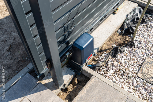 Automatic sliding gate motor drive installation