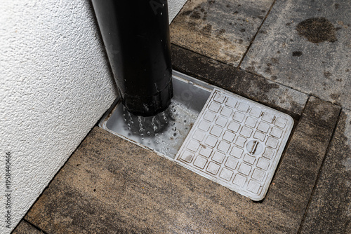 Rainwater draining into settling tank system