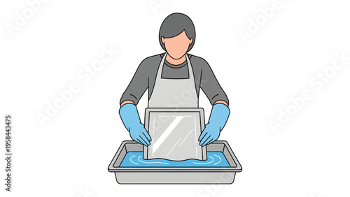 Artisan's Hand: A focused artisan gently handles a sheet of art in a water bath, with gloves protecting their hands, preparing it for the artistic process.