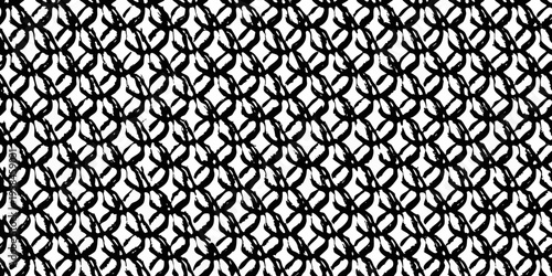 Intricate black and white pattern resembling a woven fishnet texture