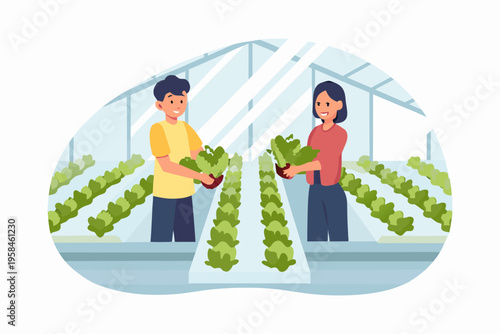 Two people tending to leafy green plants inside a greenhouse