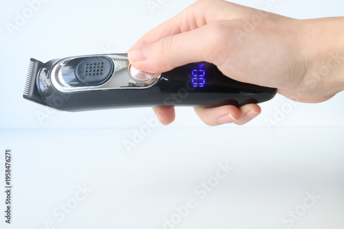 Photo taken in Poland, Krakow, March, hair and beard clippers, personal care and hygiene, stylish hairstyle, home appliances, clipper in hand