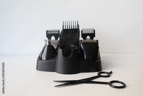 The photo was taken in Poland, Krakow, March. Various items and devices for hair and beard trimming, hair clipper attachments, hairdresser, scissors.