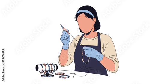 Artisan's Craft: An artisan delicately shapes a beautiful necklace with beads and a wire, showcasing expertise in jewelry design and creative skill.