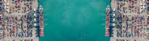 Panoramic top-down aerial view of container ports mirrored symmetrically on both sides of turquoise sea, with colorful cargo containers aligned along piers and open water space in center, creating str