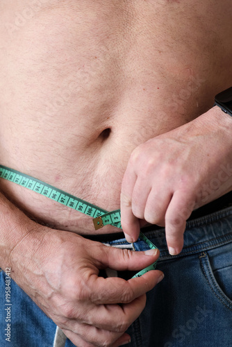 close-up of a fat man's belly