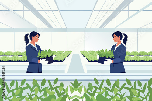 Woman examines seedlings in a modern bright greenhouse environment